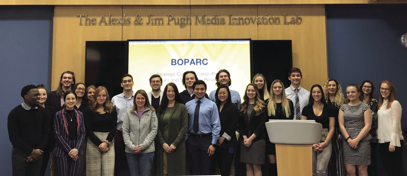 Students from the Martin Hall Agency pose with members from Morgantown’s BOPARC after pitching their ideas to them.
